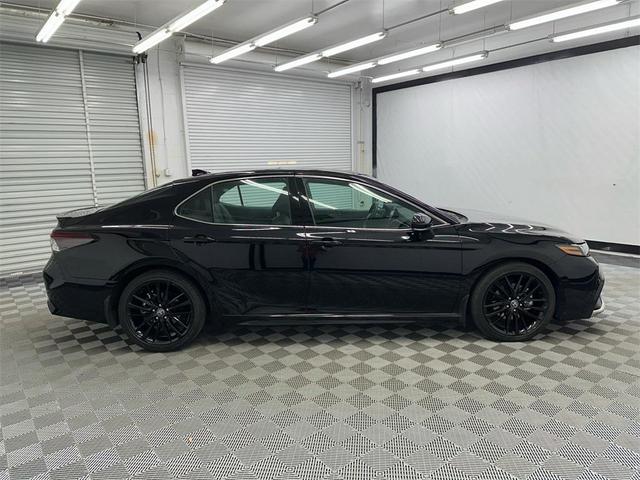 Photo of 2024 Midnight Black Metallic Toyota Camry