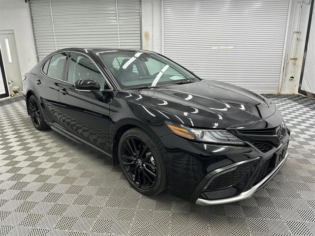 Photo of 2024 Midnight Black Metallic Toyota Camry