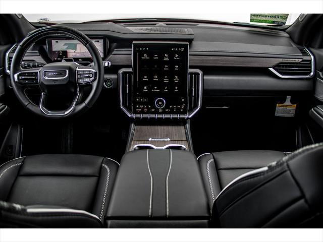 Photo of 2025 Volcanic Red Tintcoat GMC Acadia