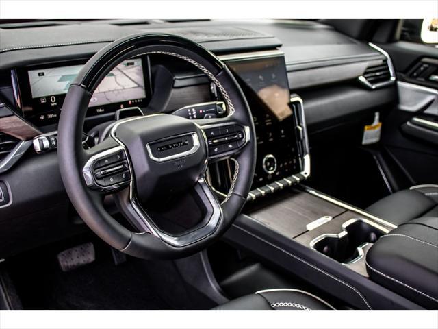Photo of 2025 Volcanic Red Tintcoat GMC Acadia