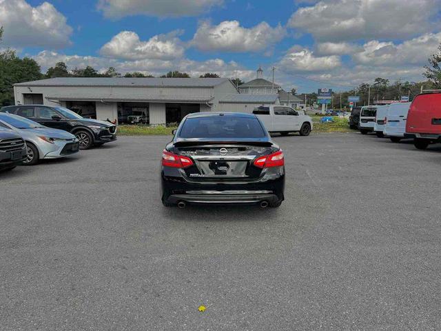 Photo of 2016 Super Black Nissan Altima