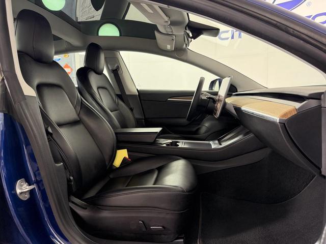 Photo of 2022 Deep Blue Metallic Tesla Model 3