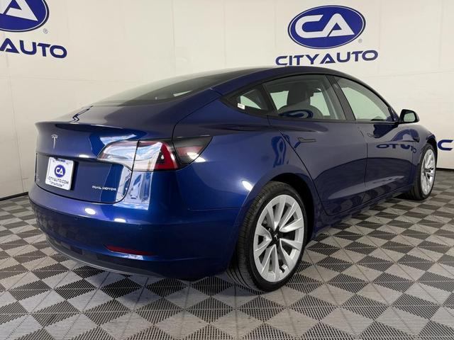 Photo of 2022 Deep Blue Metallic Tesla Model 3