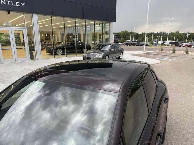 Photo of 2023 Copper Ruby Metallic Porsche Macan