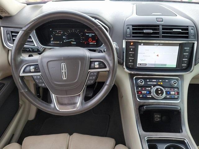 Photo of 2019 Ruby Red Metallic Tinted Clearcoat Lincoln Continental