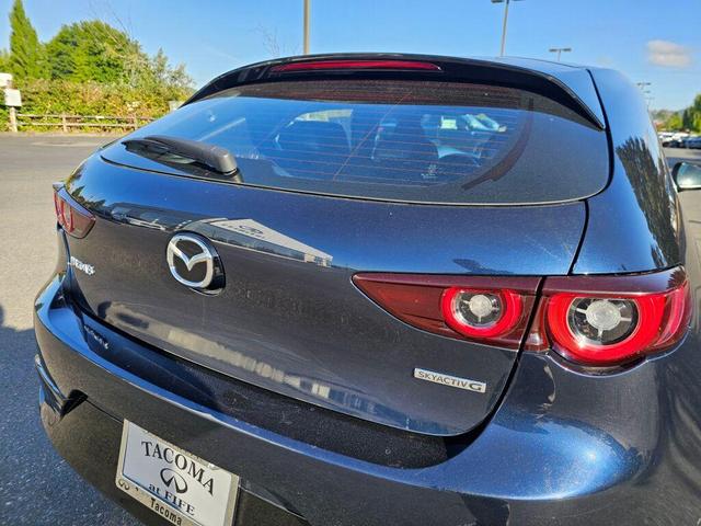Photo of 2024 Deep Crystal Blue Mica Mazda Mazda3