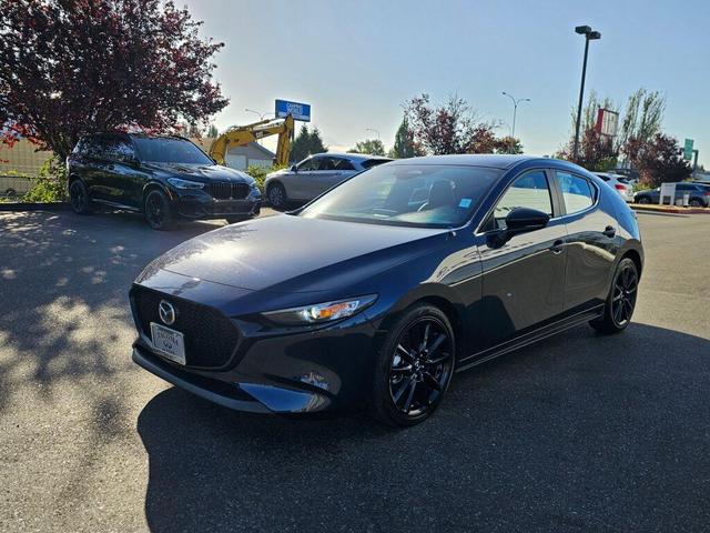 Photo of 2024 Deep Crystal Blue Mica Mazda Mazda3