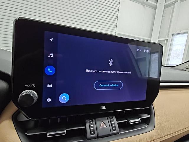 Photo of 2024 Beige Toyota RAV4 Hybrid