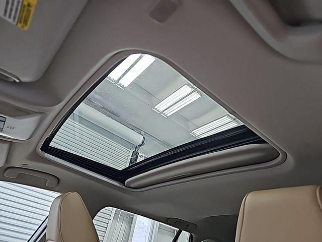 Photo of 2024 Beige Toyota RAV4 Hybrid