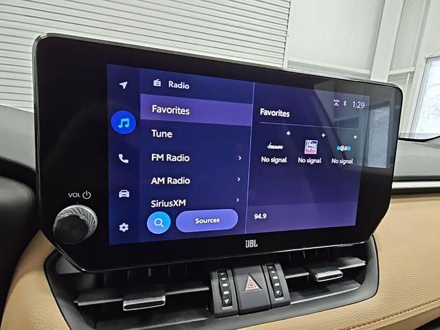 Photo of 2024 Beige Toyota RAV4 Hybrid