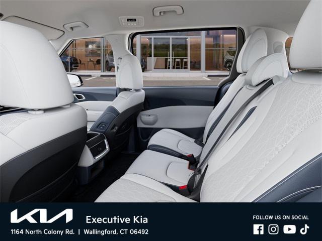 Photo of 2026 Black Kia Carnival Hybrid