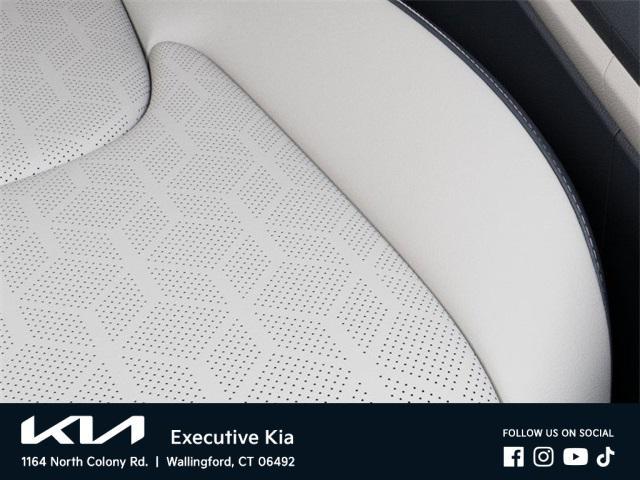 Photo of 2026 Black Kia Carnival Hybrid