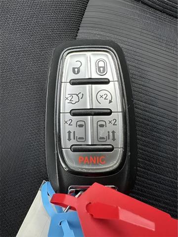 Photo of 2023 Silver Mist Clearcoat Chrysler Voyager