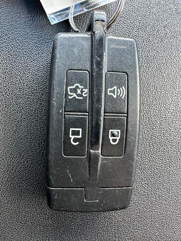 Photo of 2010 Ingot Silver Metallic Ford Taurus