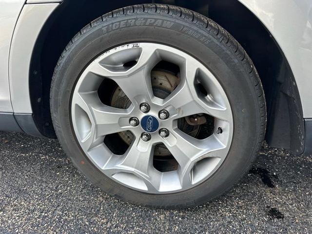 Photo of 2010 Ingot Silver Metallic Ford Taurus