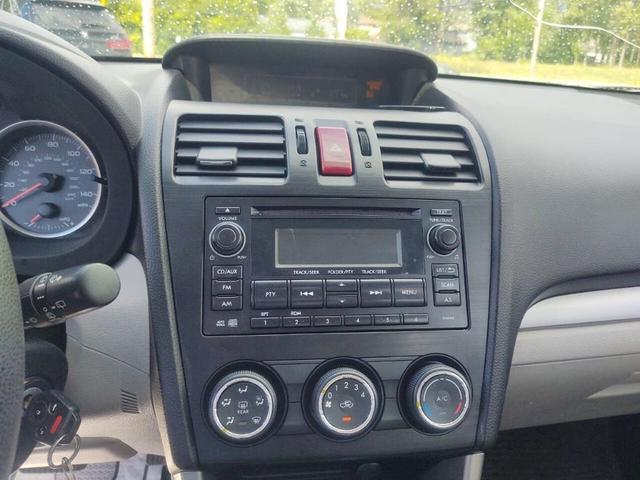 Photo of 2014 Jasmine Green Metallic Subaru Forester