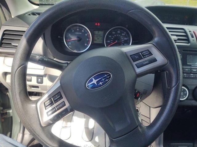 Photo of 2014 Jasmine Green Metallic Subaru Forester