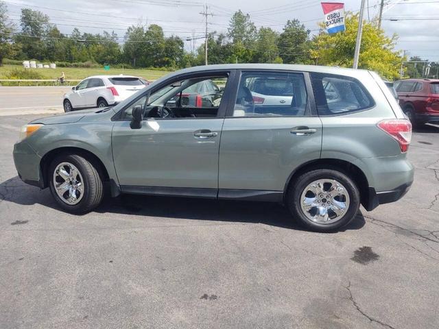 Photo of 2014 Jasmine Green Metallic Subaru Forester