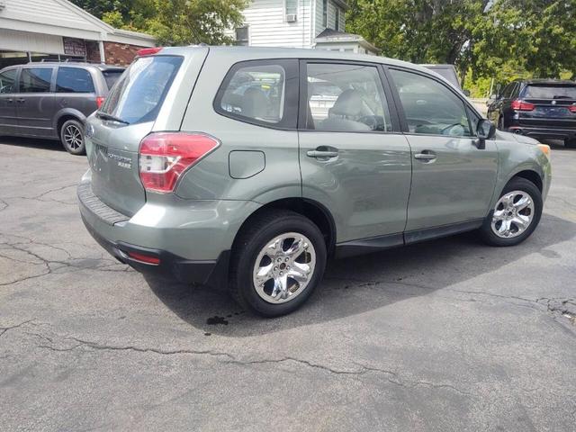 Photo of 2014 Jasmine Green Metallic Subaru Forester