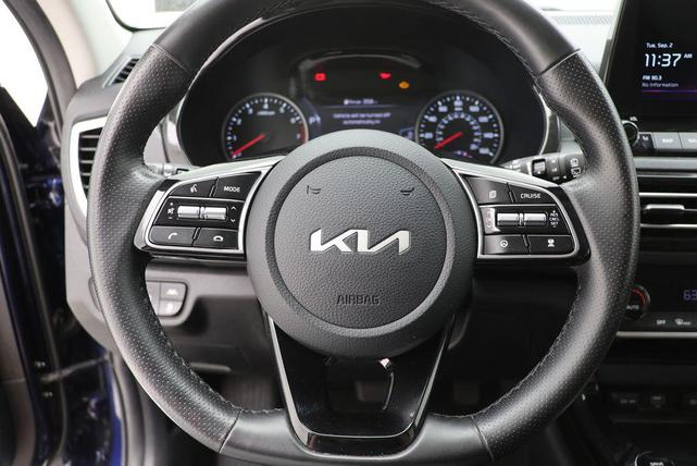Photo of 2023 Dark Ocean Blue/Black Roof Kia Seltos