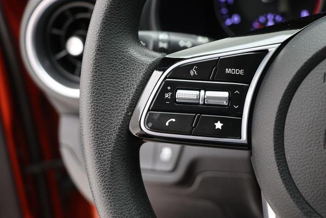 Photo of 2023 Fire Orange Kia Forte
