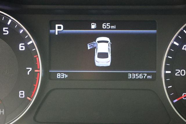 Photo of 2023 Fire Orange Kia Forte