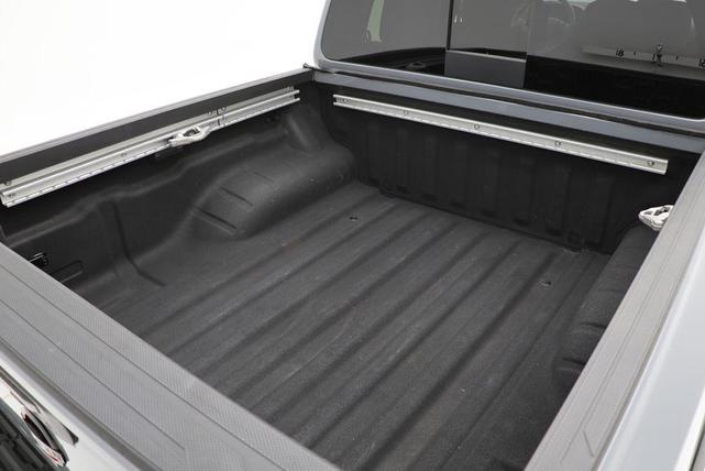 Photo of 2023 Boulder Gray Pearl Nissan Frontier