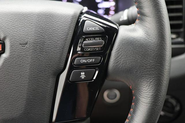 Photo of 2023 Boulder Gray Pearl Nissan Frontier