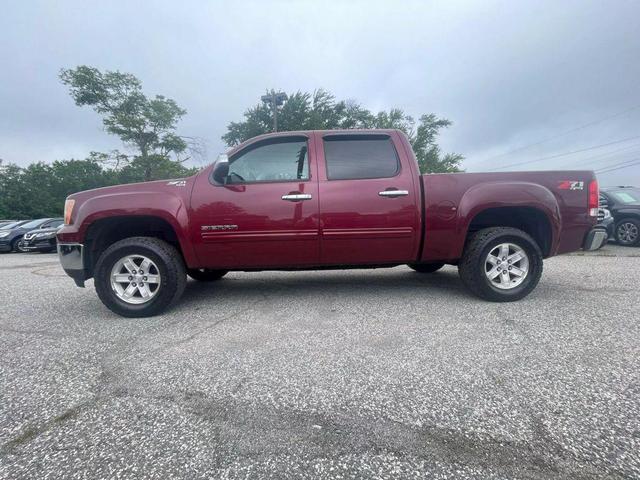 Photo of 2013 Maroon GMC Sierra 1500