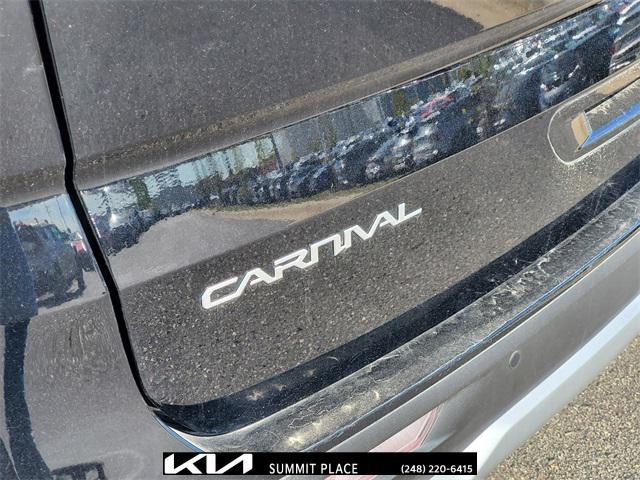 Photo of 2024 Aurora Black Pearl Kia Carnival