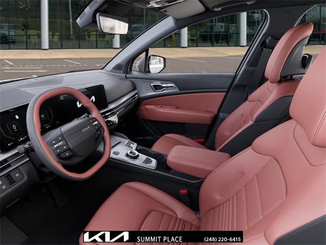Photo of 2026 Wolf Gray Kia Sportage Hybrid