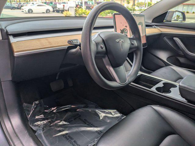 Photo of 2023 Silver/Gray Tesla Model 3