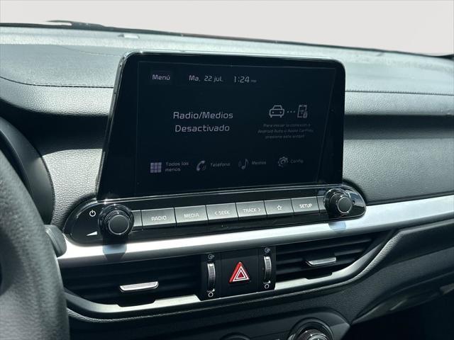 Photo of 2024 Currant Red Kia Forte