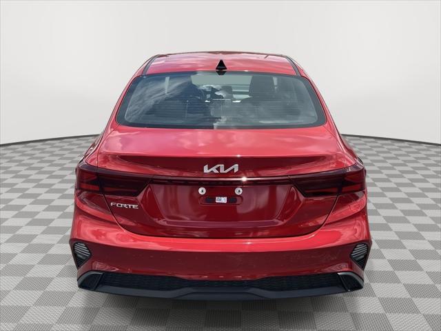 Photo of 2024 Currant Red Kia Forte
