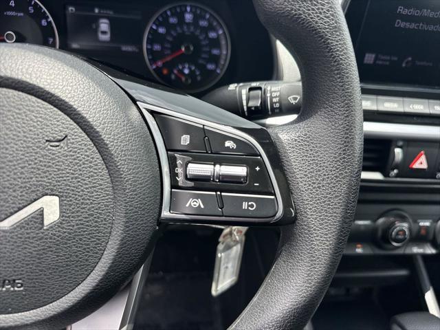 Photo of 2024 Currant Red Kia Forte