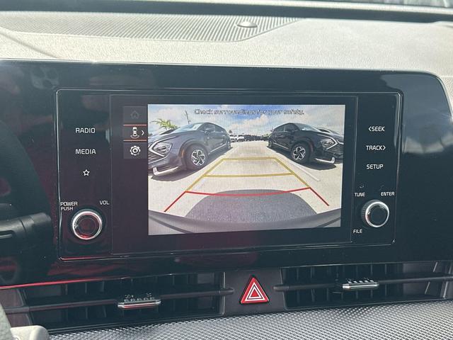 Photo of 2025 Snow White Pearl Kia Sportage Hybrid