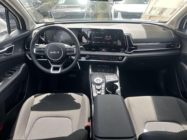 Photo of 2025 Snow White Pearl Kia Sportage Hybrid