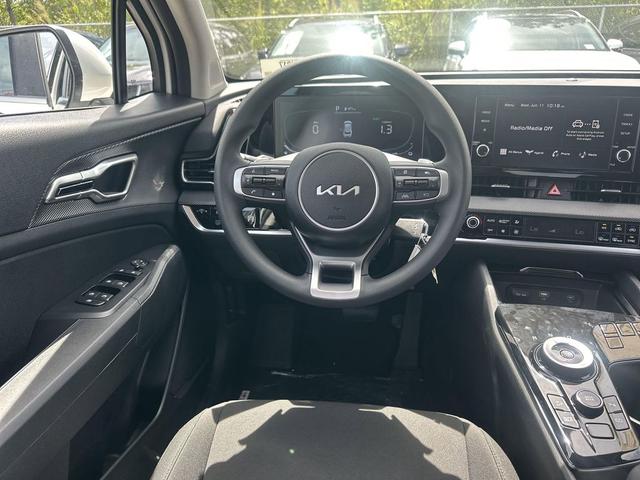 Photo of 2025 Snow White Pearl Kia Sportage Hybrid