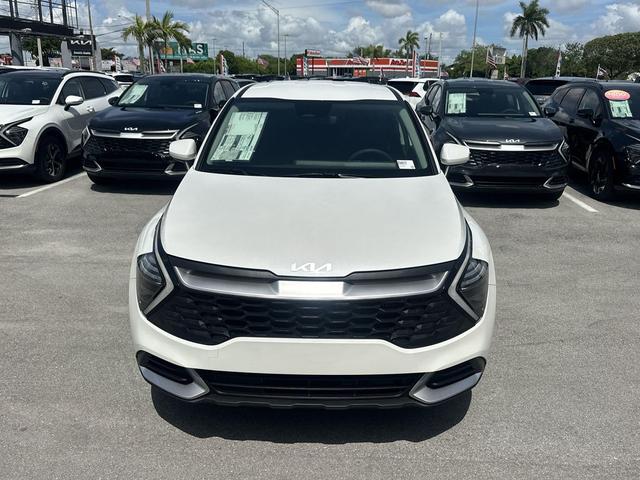Photo of 2025 Snow White Pearl Kia Sportage Hybrid