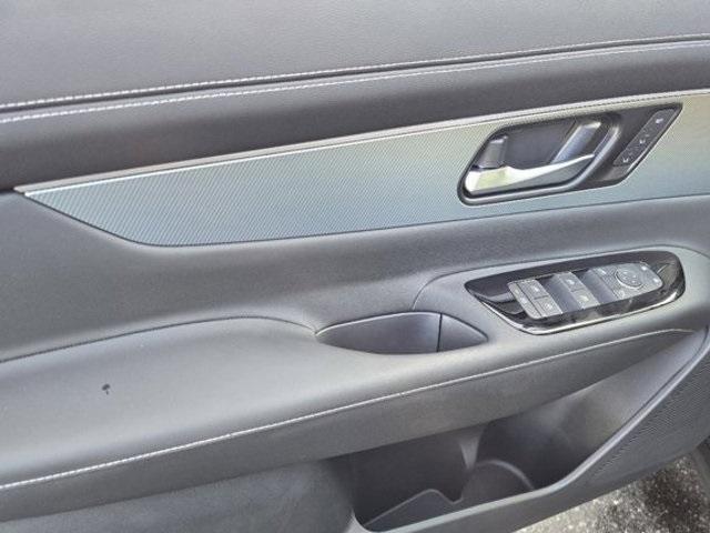 Photo of 2025 2t Blu Blk Roof Nissan Murano