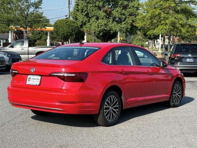 Photo of 2021 Tornado Red Volkswagen Jetta