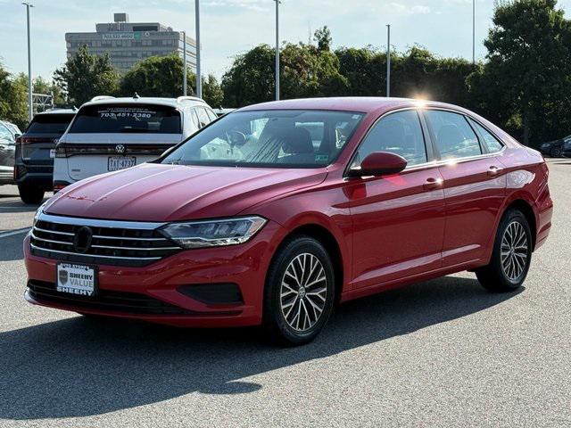 Photo of 2021 Tornado Red Volkswagen Jetta