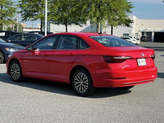 Photo of 2021 Tornado Red Volkswagen Jetta
