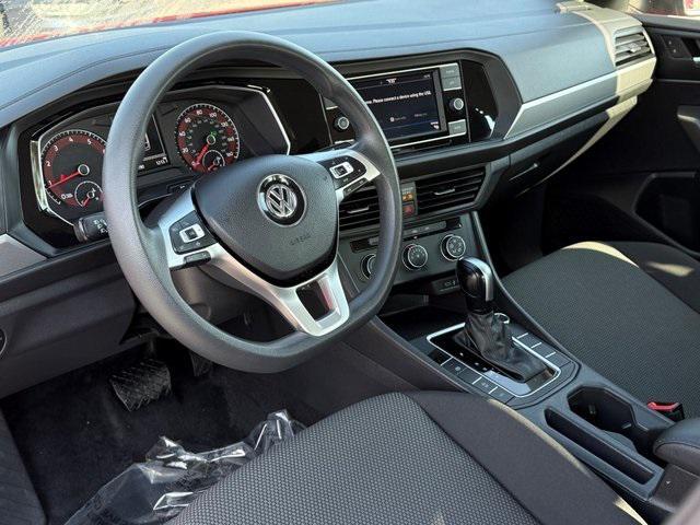 Photo of 2021 Tornado Red Volkswagen Jetta