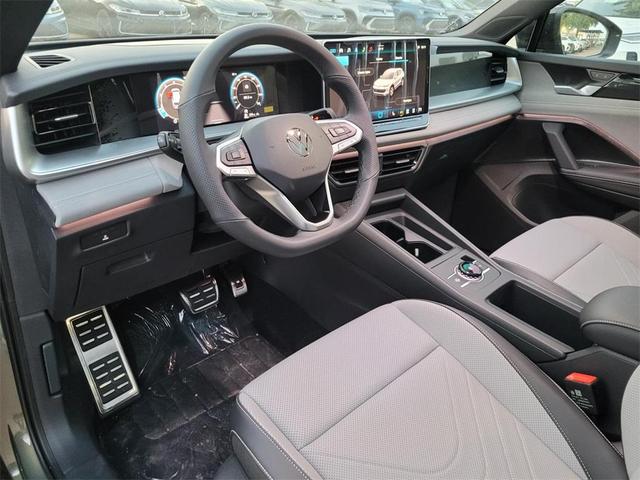 Photo of 2025 Avocado Green  W/Black Roof Volkswagen Tiguan