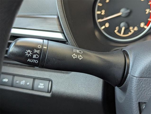Photo of 2024 Pearl White Tricoat Nissan Altima