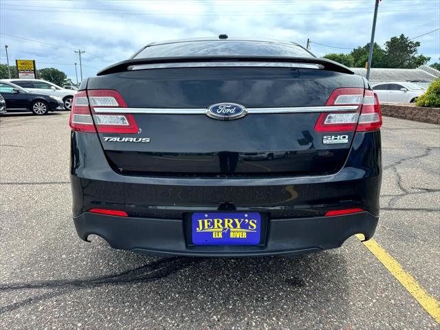 Photo of 2014 Tuxedo Black Metallic Ford Taurus