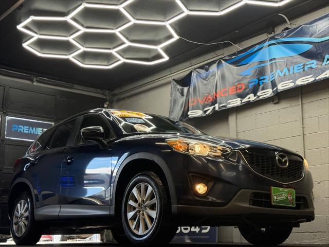 Photo of 2015 Deep Crystal Blue Mica Mazda CX-5
