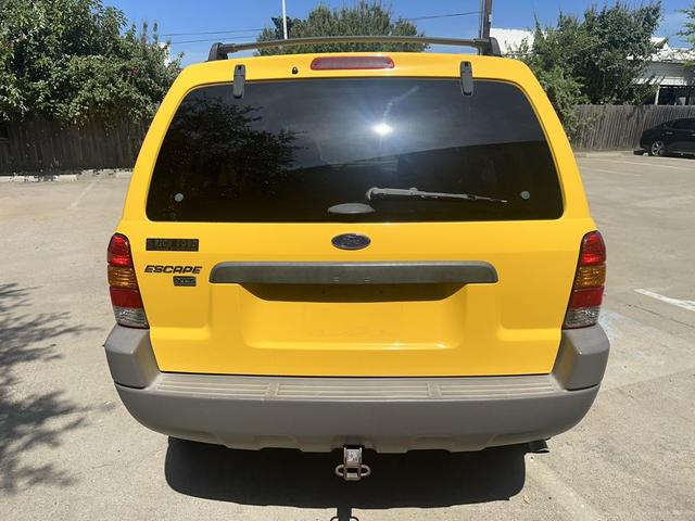 Photo of 2002 Chrome Yellow Clearcoat Ford Escape
