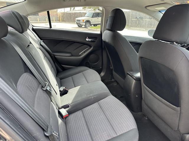 Photo of 2014 Metallic Bronze Kia Forte